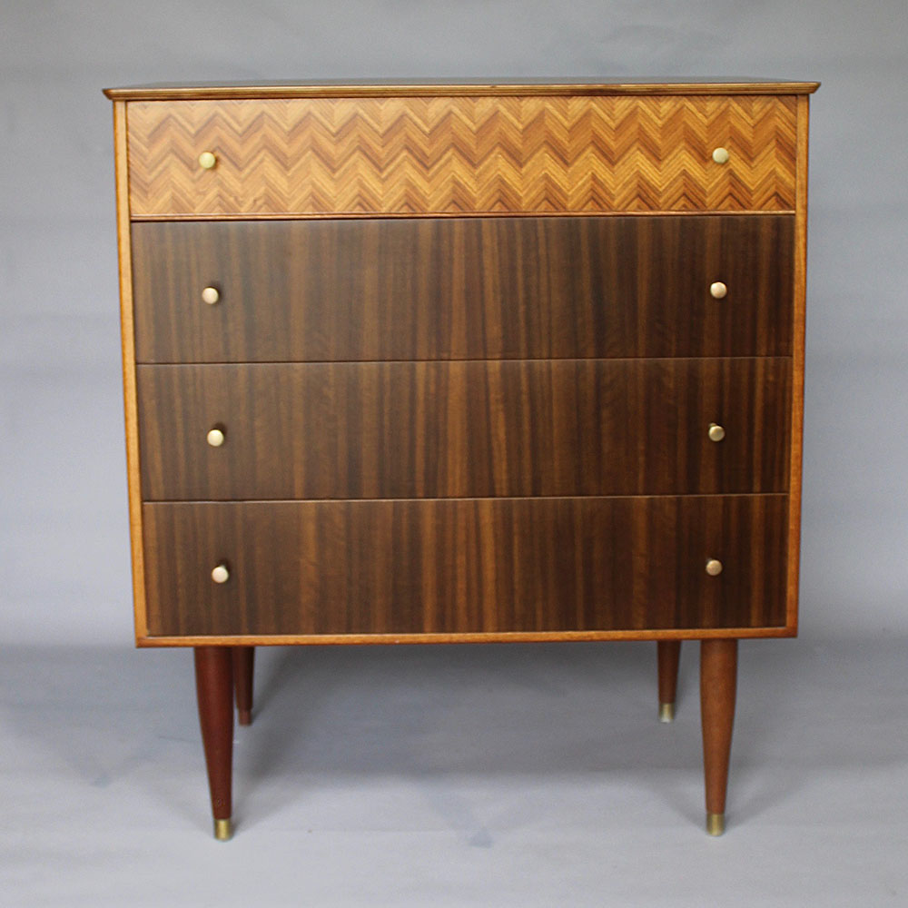 A 1959’s walnut Uniflex chest of drawers designed by Peter Hayward.