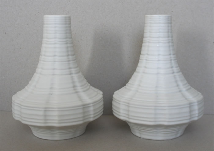 Heinrich matte white ‘space capsule’ vases.