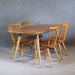 A 1950's Ercol rectangular Dining table and chairs
