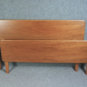 A 1950’s Gordon Russell walnut double bed frame