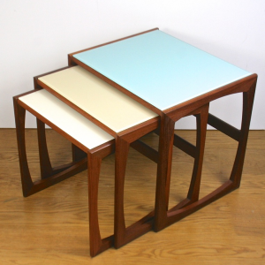 A nest of up-cycled GPlan quadrille tables