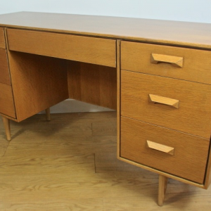 A Mid 20th century Stag ‘Concord’ Oak desk by John and Sylvia Reid