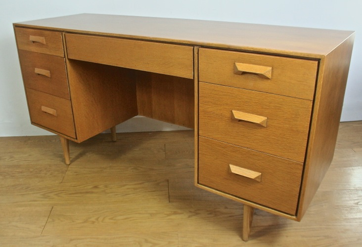 A Mid 20th century Stag ‘Concord’ Oak desk by John and Sylvia Reid