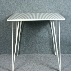 A vintage 1950’s formica grey check table with eiffel legs