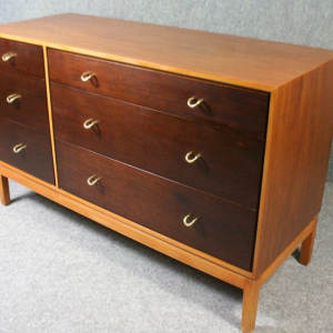A Stag small cabinet/ chest of drawers designed by John and Sylvia Reid