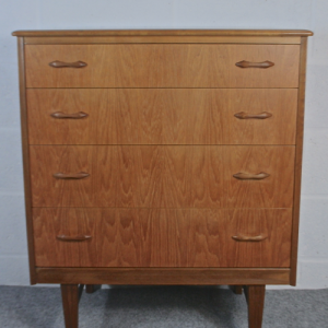 A 1950’s teak Danish style 4 graduated chest of drawers