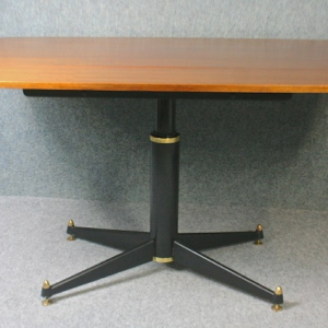 A 1950’s GPlan Librenza teak rise and fall dining table