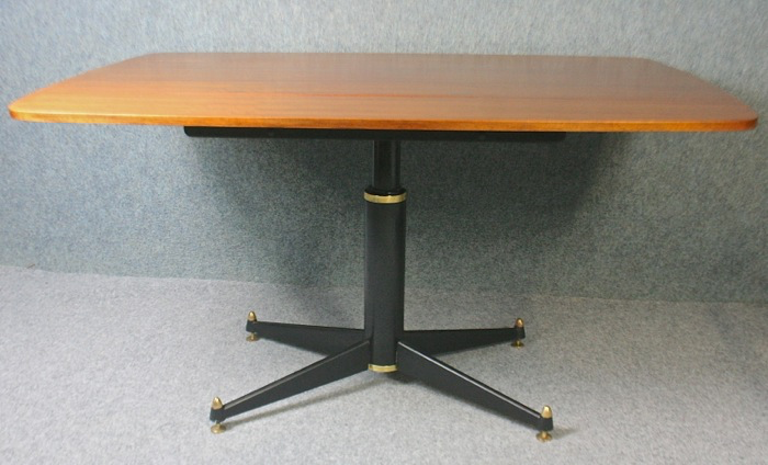 A 1950’s GPlan Librenza teak rise and fall dining table