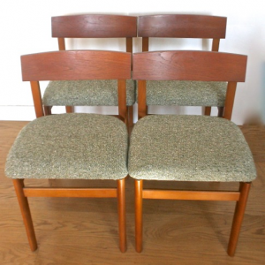 A Mid 20th century set of four teak dinning chairs