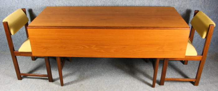A 1950s folding teak dining table and four chairs - Image 4