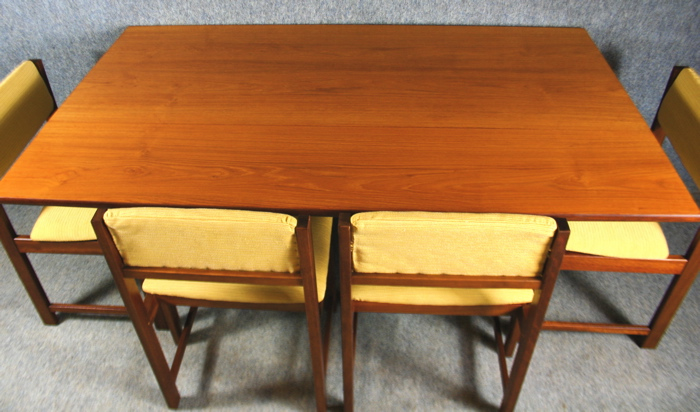 A 1950s folding teak dining table and four chairs - Image 5