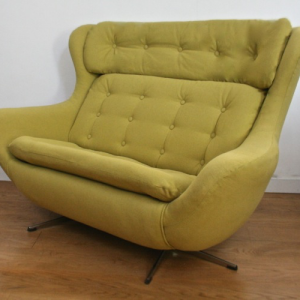 An iconic 1960’s button back sofa egg shaped 2 seat sofa