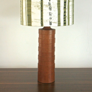 A 1950’s Danish teak table lamp and vintage shade in  Lucienne day 'Tickertape'.