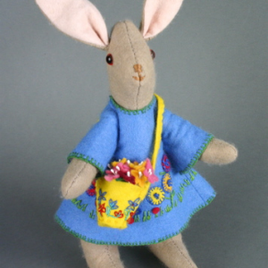 A traditional hand-made female felt rabbit
