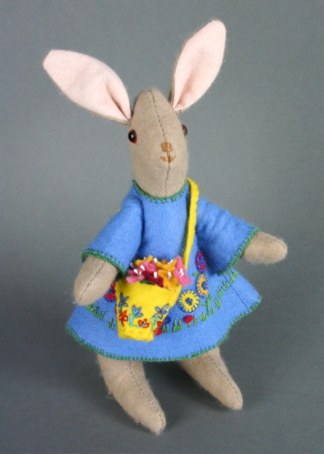 A traditional hand-made female felt rabbit