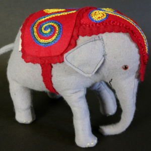 A traditional handmade felt baby elephant