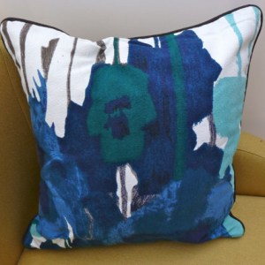 A vintage handmade piped cushion 'Pansies' fabric designed by Howard Carter for Heals rare 1960's fabric.