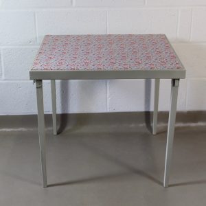 An up-cycled folding occasional table covered in Cath Kidston style oilcloth