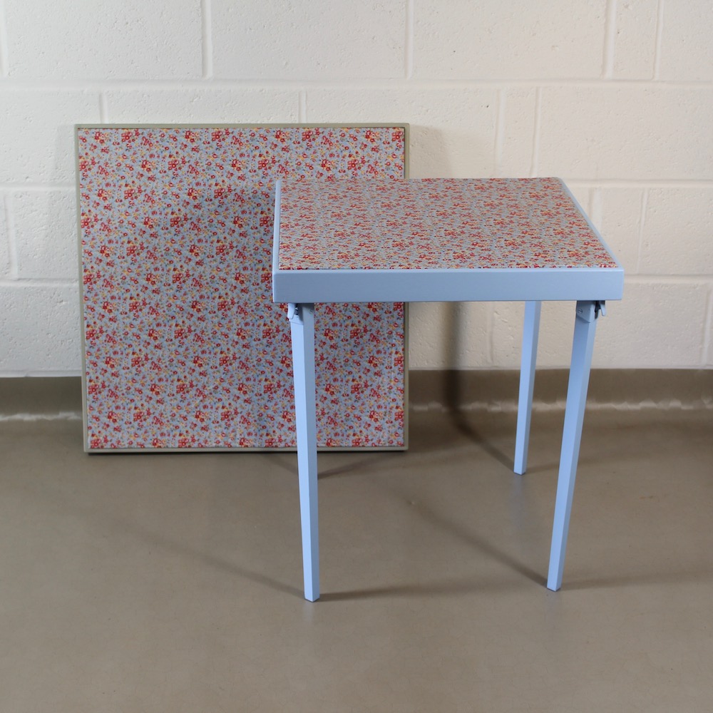 An up-cycled folding occasional table covered in Cath Kidston style oilcloth