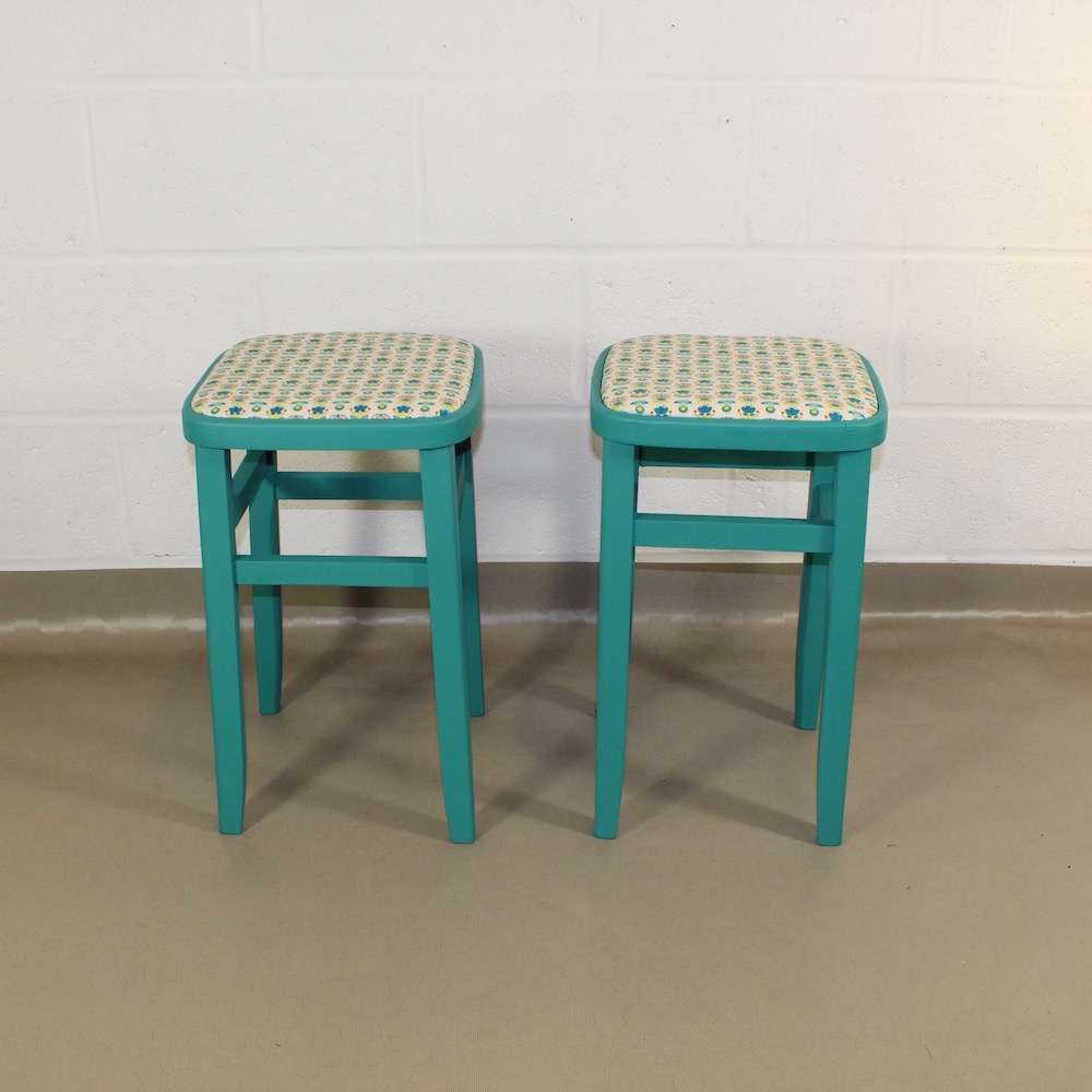 pair of up-cycled turquoise kitchen stools covered in Holly Scandi style oilcloth