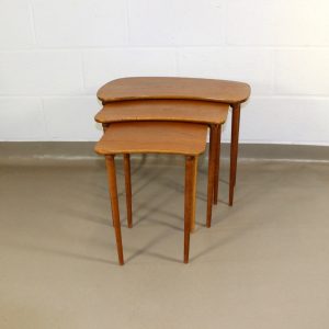 A nest of 1950's teak tables