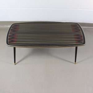 A Mid 20th century glass topped table