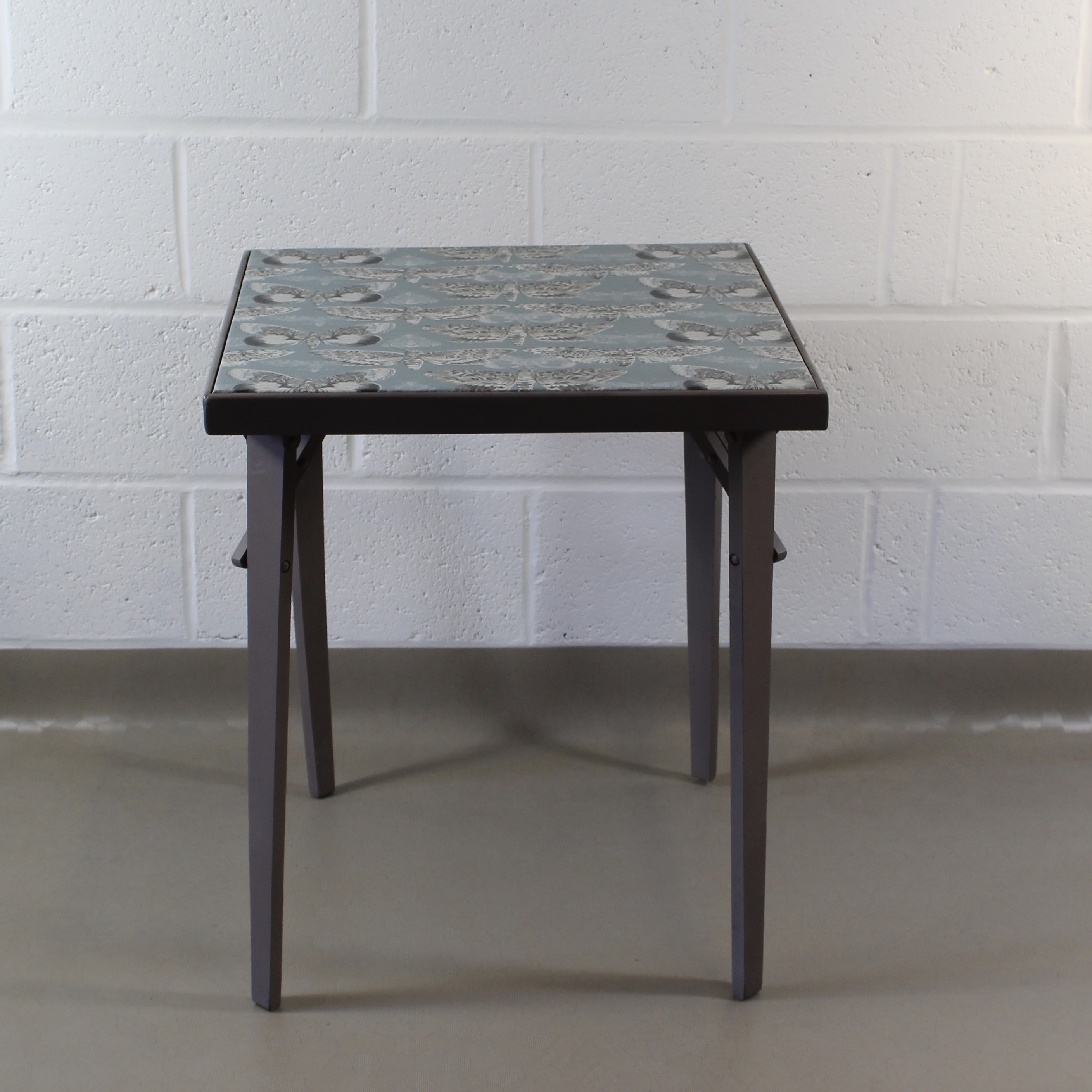 An up-cycled folding occasional table covered in Voyage Nocturnal in seathistle. - Image 7