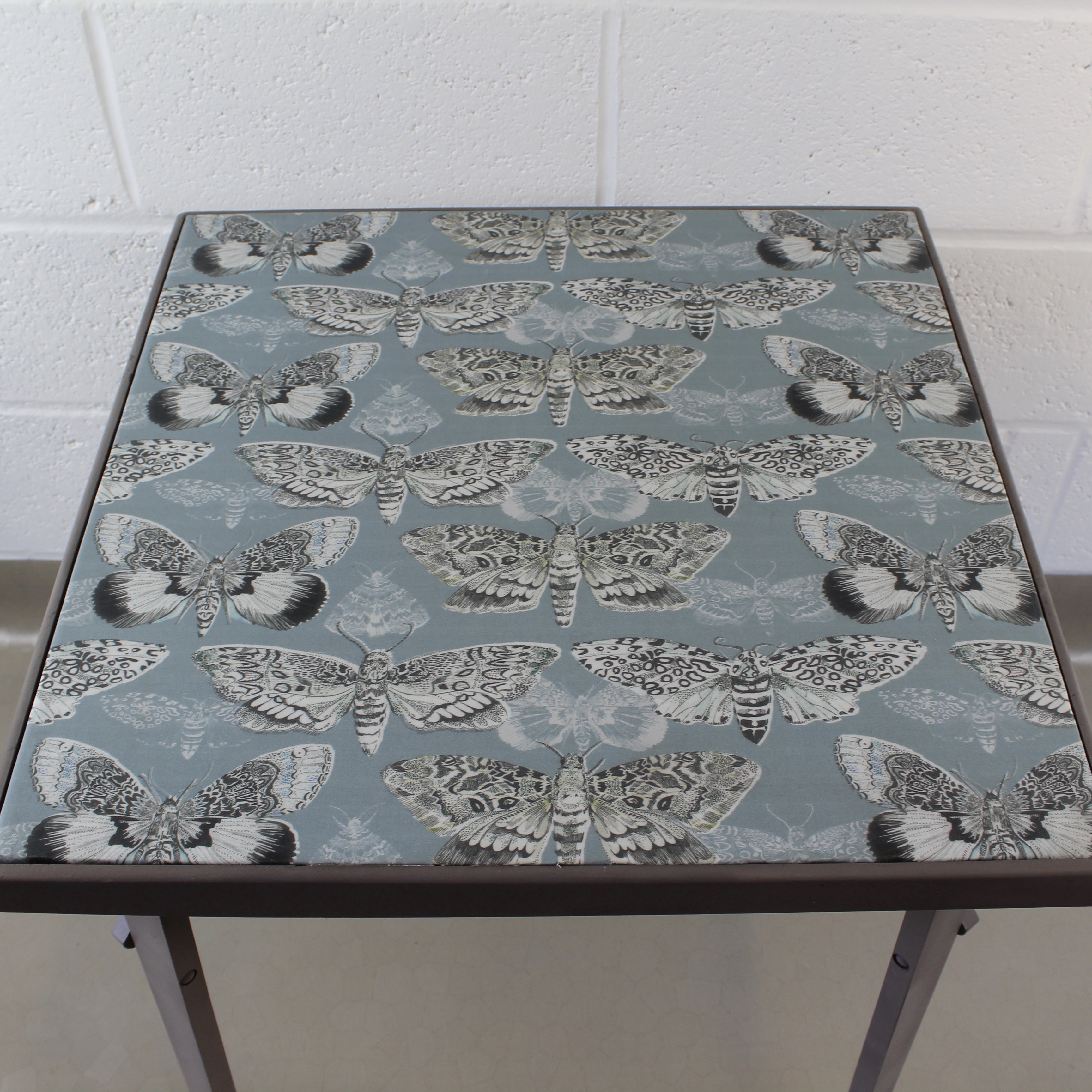 An up-cycled folding occasional table covered in Voyage Nocturnal in seathistle. - Image 5