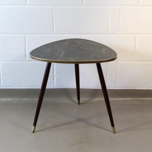 A 1950's Fabric covered triangular occasional table