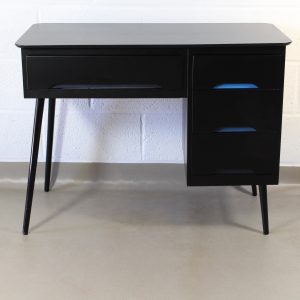An upcycled 1960's black and blue desk
