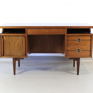 A midcentury large walnut desk with rattan back possibly Danish