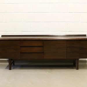 A 1960's White and Newton curved back lip sideboard .