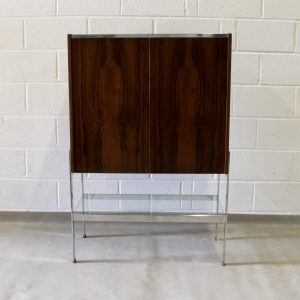 A 1970's Merrow Associates rosewood cocktail cabinet.