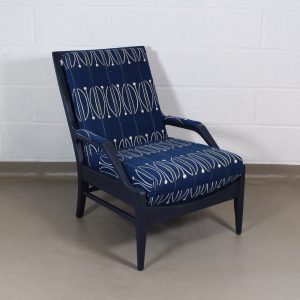 A rare 1950's upcycled blue E15 Cintique chair upholstered in Michael O'Connel 'Segment' fabric for Heals