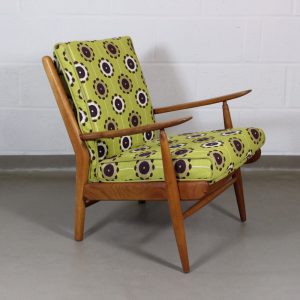 A 1950's midcentury chair upholstered in Clarke and Clarke citrus 'celeste' fabric