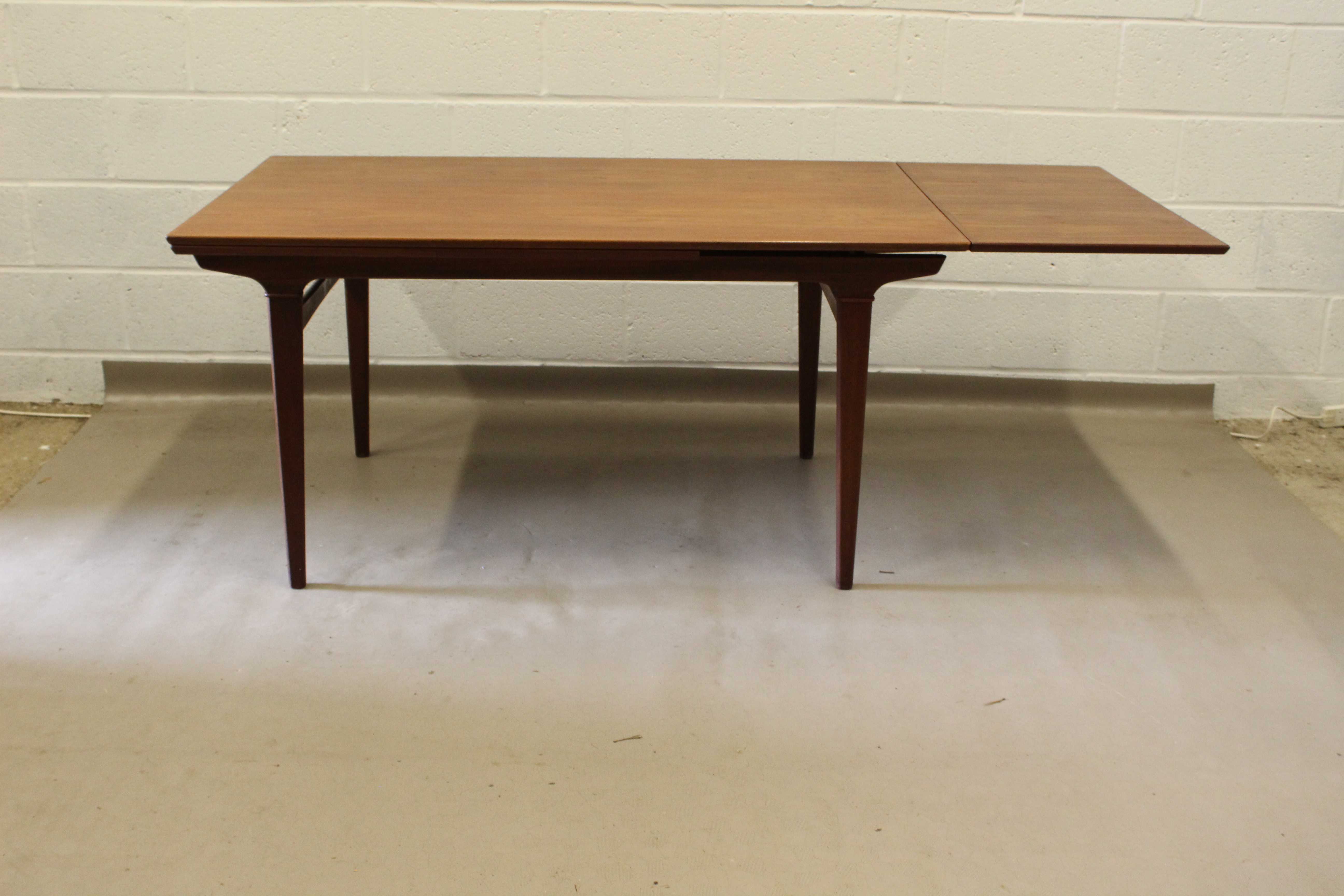 A 1950's Danish teak extending dinning table. - Image 2