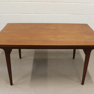 A 1950's Danish teak extending dinning table.