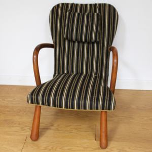 A 1940's 'clam' Musling chair attributed to Philip Arctander
