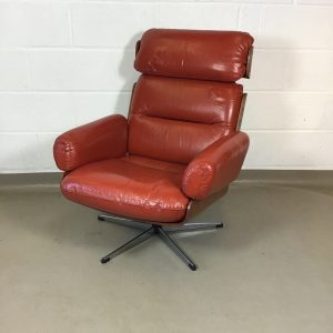 A 1960s/ 70s Guy Rogers  teak and leather swivel chair.