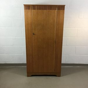 A 1960s oak inlaid Lebus single gentleman’s wardrobe.