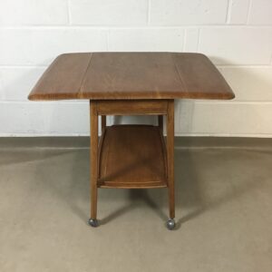 A Vintage oak, Ercol syle trolley/ table.
