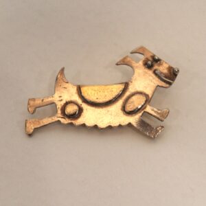 'Dog ' brooch silver with gold plate.