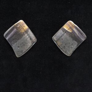 Small square studs in blue, gold and  purple.
