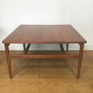 A 1960's large square teak coffee table