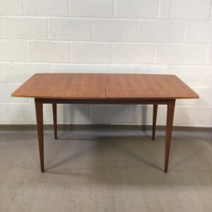 A 1960s Mcintosh teak extending dining table