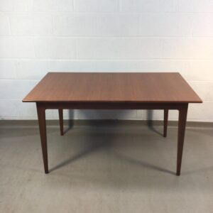 A midcentury teak dining table