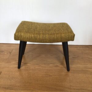 Small 1950's mustard  footstool on black legs