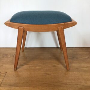 A lovely 1950's beech stool with teal felt pad