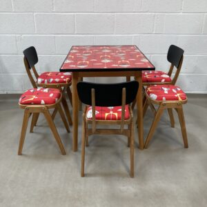 A lovely up-cycled  midcentury kitchen dining set decorated in Sandersons  Marion Mahler, Red mobiles