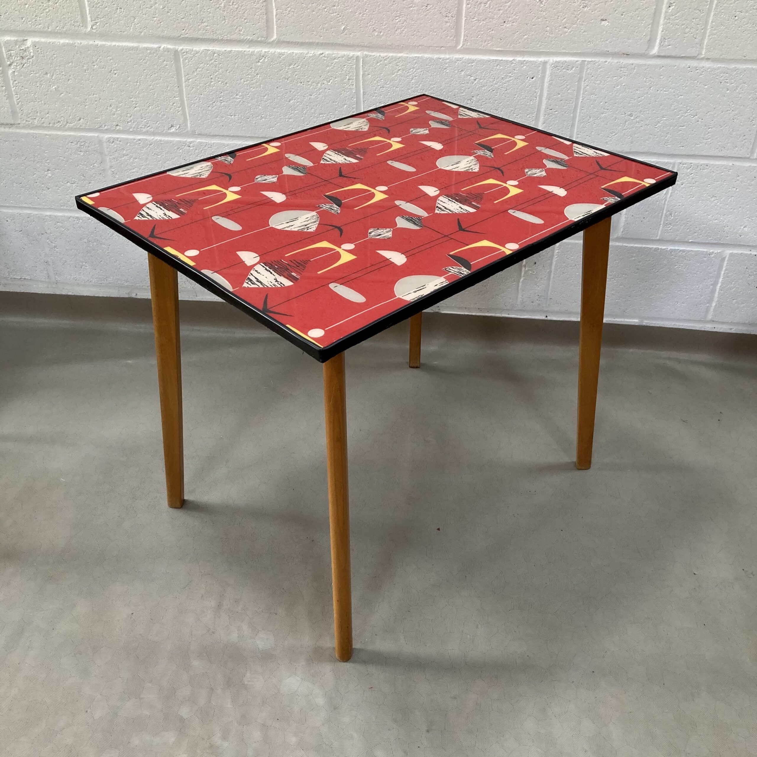 A lovely up-cycled midcentury kitchen dining set decorated in Sandersons Marion Mahler, Red mobiles - Image 9
